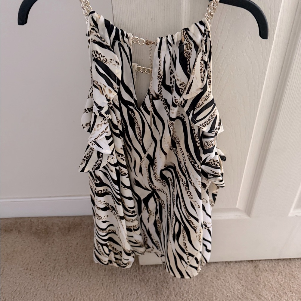 Very cute top worn a couple times